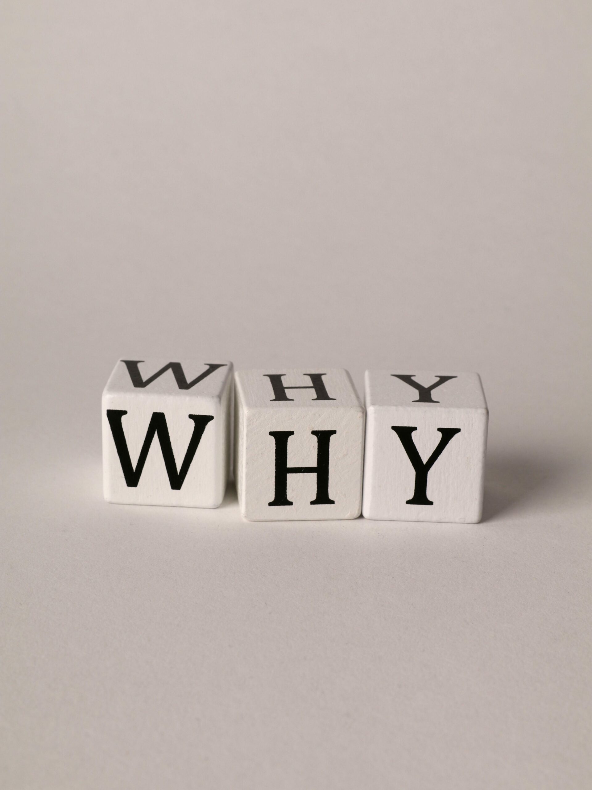 The Word Why Made with Cubes with Letters